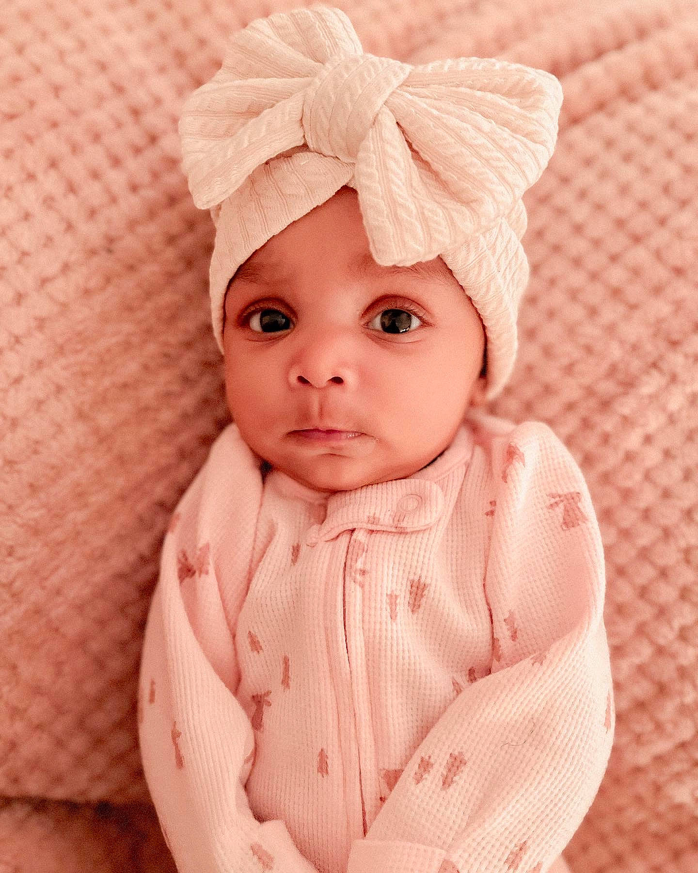 Ivy joined the competition — help win amazing prizes! baby, baby_toddler_clothing, cap, cheek, costume_hat, eye, face, head, headwear, human_body, iris, knit_cap, lip, neck, outerwear, person, pink, skin, sleeve, textile