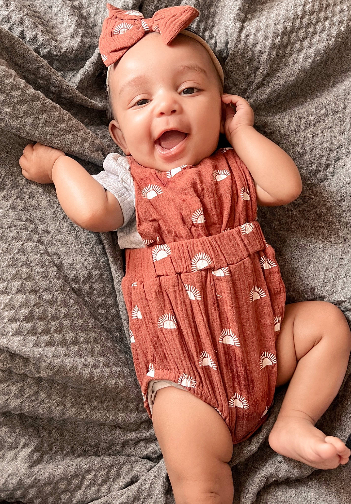 Ivy is registered to the contest to win money with this photo: baby, baby_toddler_clothing, cap, cheek, collar, dress, finger, happy, head, headgear, iris, lip, one_piece_garment, person, pink, red, skin, sleeve, smile, thigh