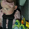 Lainey joined the competition — help win amazing prizes! baby, infant, car_seat, pink_bow, headband, child, seatbelt, toy, blanket, car_interior, clothing, young_child, portrait, side_view, cute, secure, fabric, seat, safety, indoor
