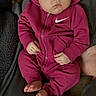 Lainey is registered to the contest to win money with this photo: baby, infant, sleeping, hoodie, magenta, nike, clothing, hands, feet, face, child, relaxing, soft, cozy, portrait, casual, indoor, cute, peaceful, young