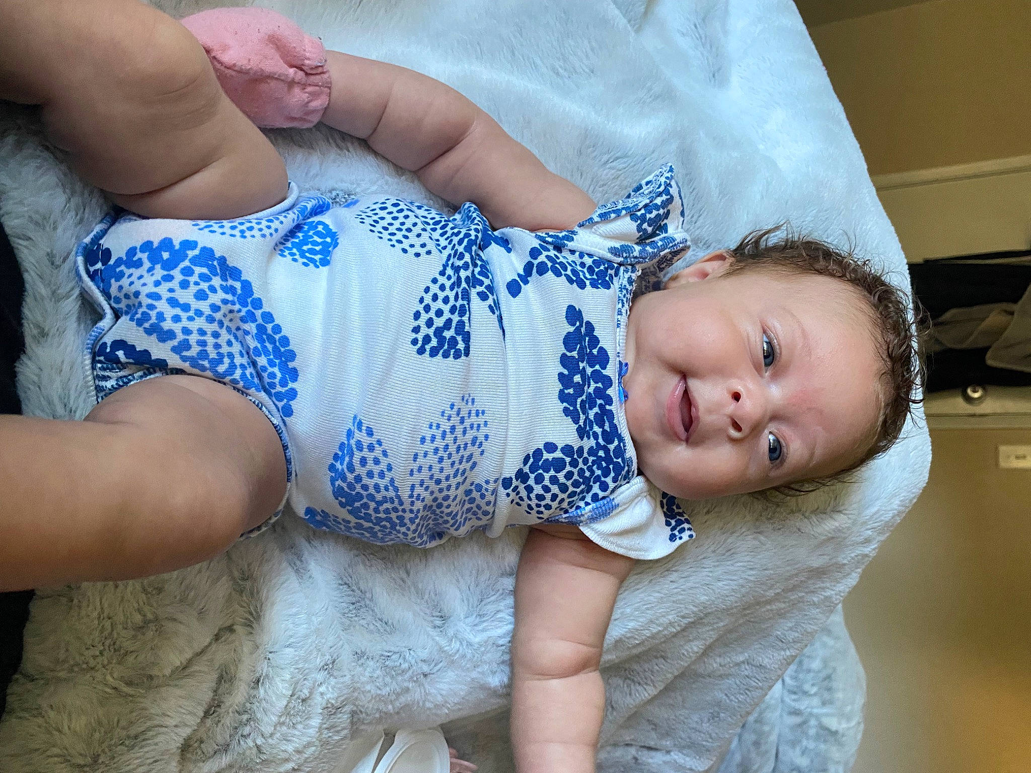 Baylee is registered to the contest to win money with this photo: abdomen, baby, baby_toddler_clothing, chest, comfort, elbow, electric_blue, human_body, human_leg, joint, knee, leg, pattern, person, shoulder, sitting, skin, sleeve, thigh, toddler