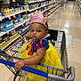 accessories, child, clothing, face, female, food, girl, grocerystore, hat, head, indoors, jewelry, market, person, photography, portrait, shelf, shop, shoppingcart, sweets