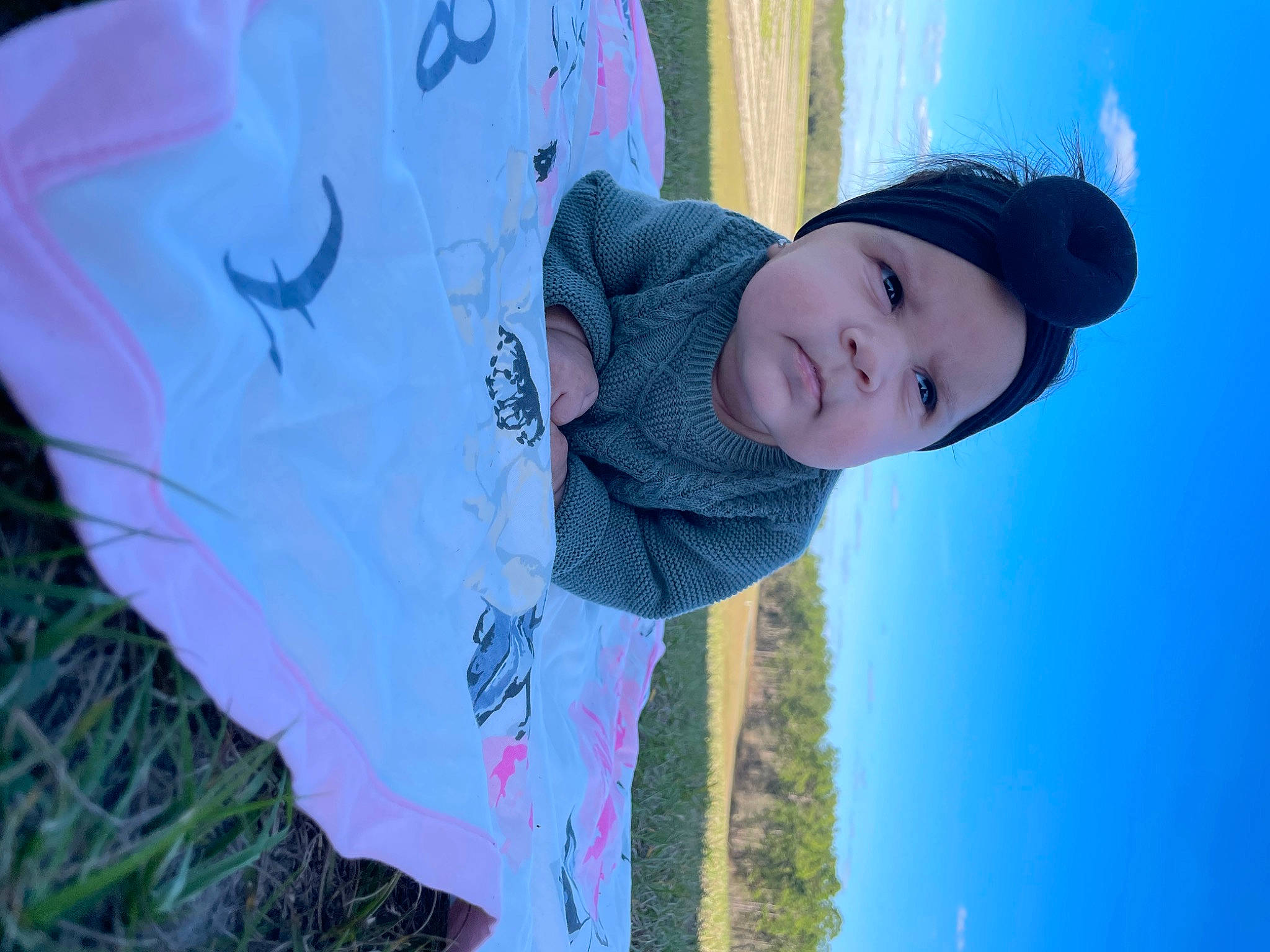 Elliana joined the competition — help win amazing prizes! cap, child, electric_blue, fashion_accessory, flash_photography, fun, grass, happy, headwear, leisure, linens, pattern, people_in_nature, person, portrait_photography, recreation, sky, sun_hat, toddler, tree