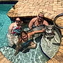 Levi is registered to the contest to win money with this photo: can, child, dog, family, handrail, husky, outdoor, people, pet, pool, relaxing, smiling, summer, sunglasses, sunlight, swimming, swimsuit, tiled_floor, water, woman