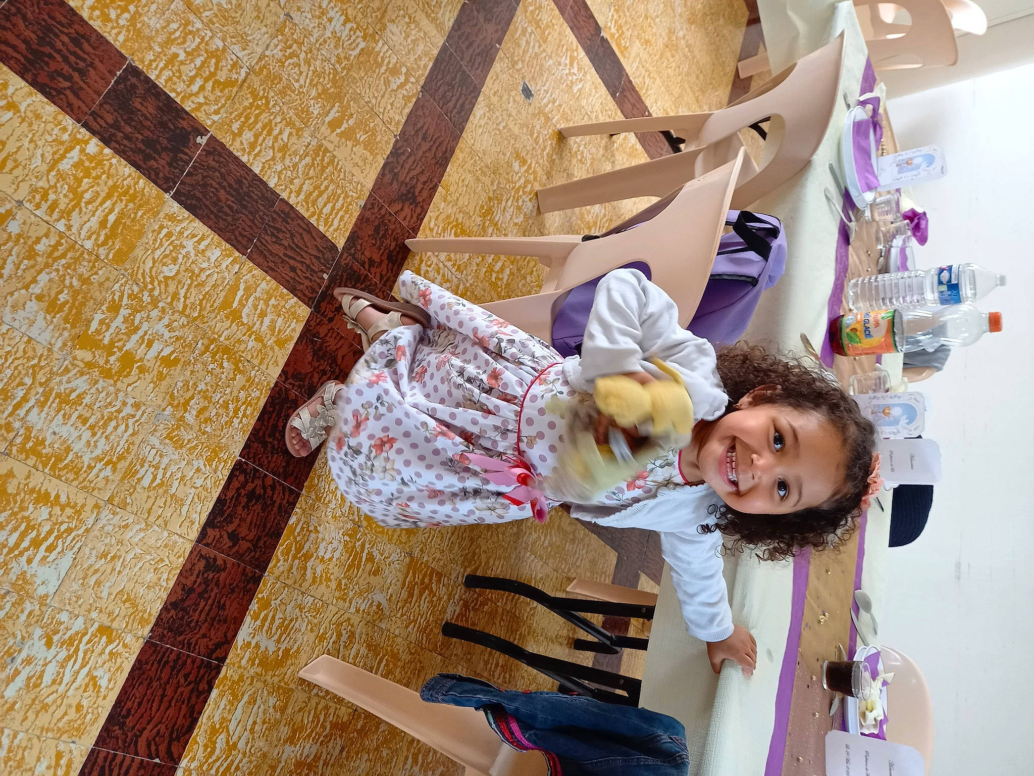 Elisa a rejoint le concours — aidez-le/la à gagner de superbes lots ! art, baby, child, flooring, fun, happy, hardwood, joy, leisure, magenta, pattern, person, play, room, sitting, smile, textile, toddler, visual_arts, wood