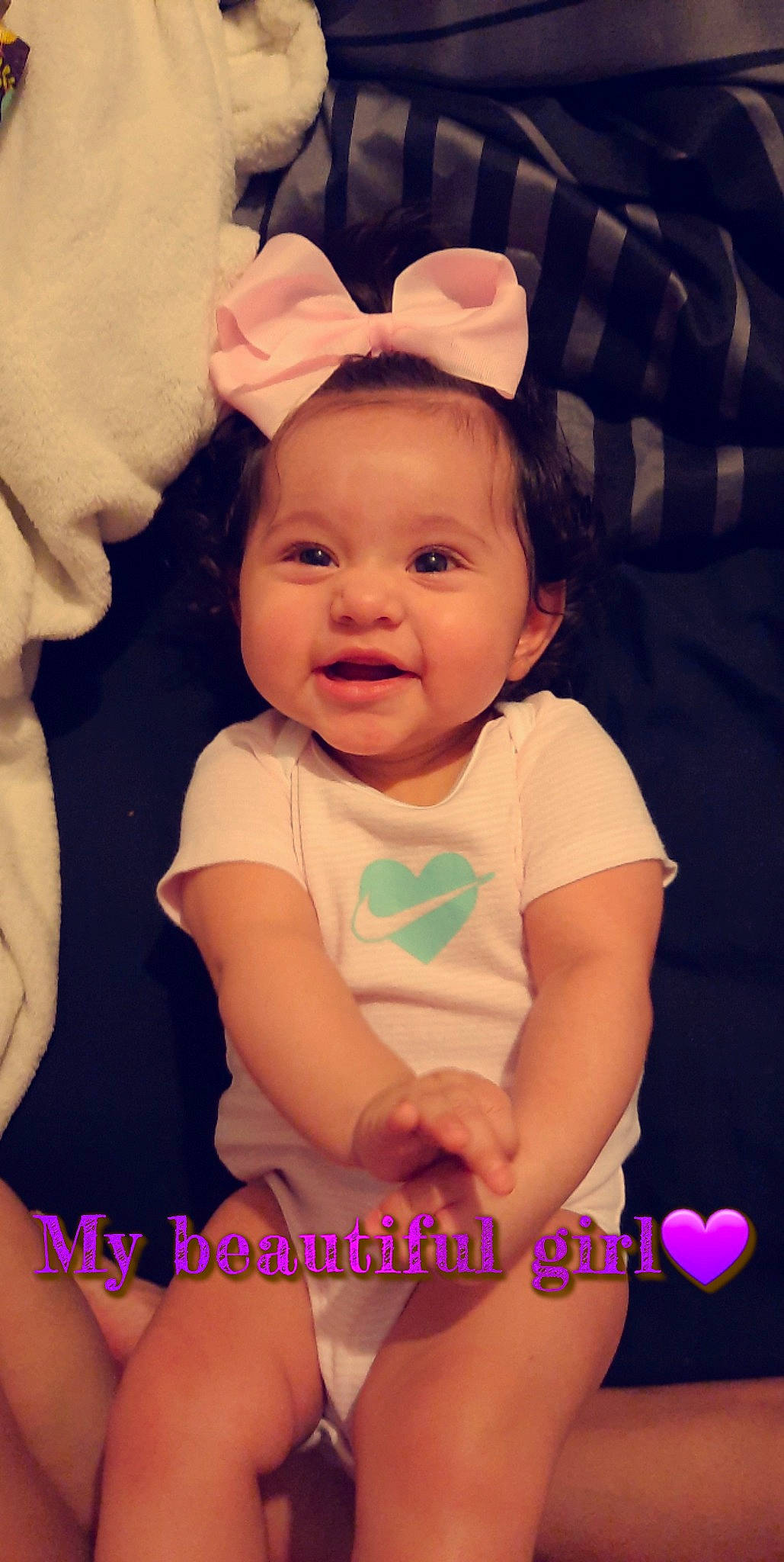 Ayana is registered to the contest to win money with this photo: baby, baby_toddler_clothing, cheek, child, costume_hat, fashion_accessory, finger, happy, headband, iris, magenta, pattern, person, pink, product, purple, skin, sleeve, smile, toddler