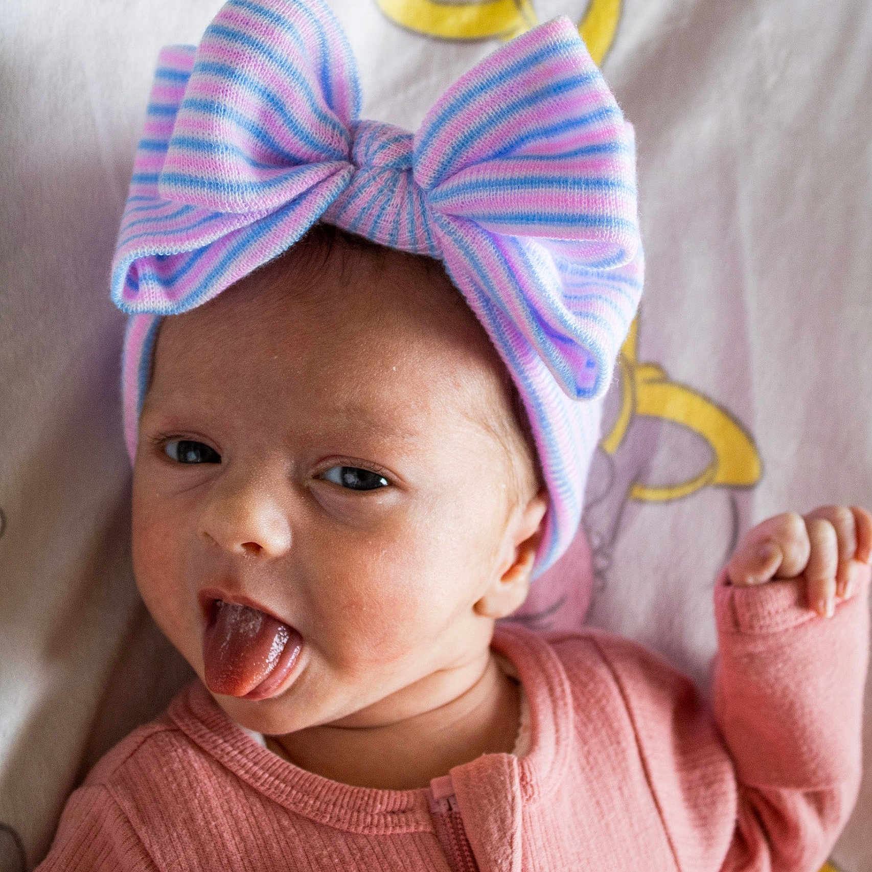 Sophia joined the competition — help win amazing prizes! accessories, baby, babylaughing, bodypart, bonnet, bowtie, clothing, face, formalwear, happy, hat, head, mouth, person, photography, portrait, smile, tie, tongue, turban