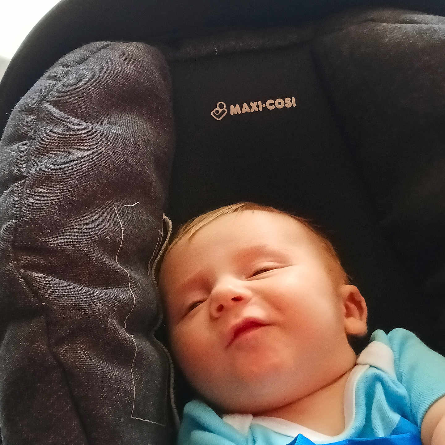 Ja'Riah joined the competition — help win amazing prizes! baby, car_seat, maxi_cosi, child, infant, blue_clothing, smile, face, young_child, seat, resting, indoors, comfort, child_seat, head, person, cute, small_child, baby_girl, baby_boy