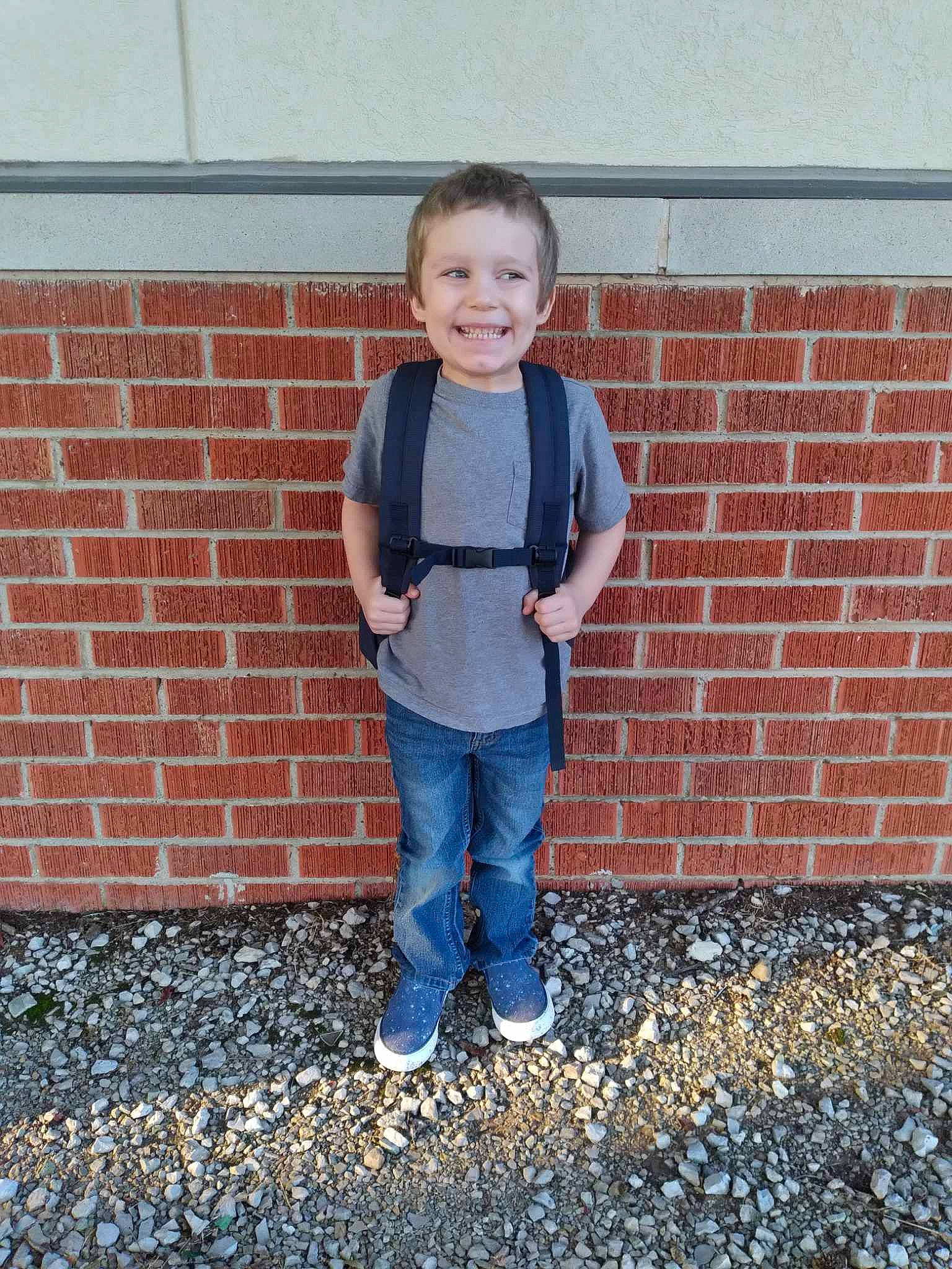 Blaike joined the competition — help win amazing prizes! asphalt, brick, brickwork, concrete, denim, door, electric_blue, face, flooring, grass, jeans, joy, pattern, people_in_nature, person, road_surface, sleeve, smile, standing, t_shirt