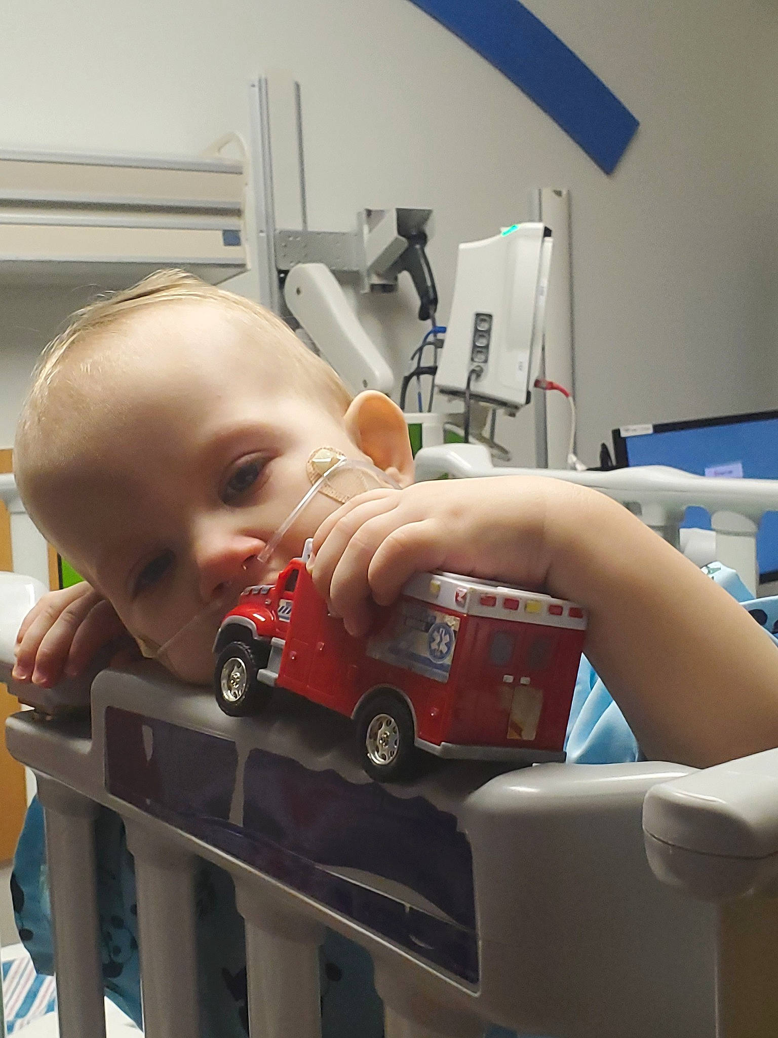 Sarah is registered to the contest to win money with this photo: baby, birth, child, hospital, medical_equipment, person, toddler