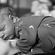 Shane joined the competition — help win amazing prizes! baby, sleeping, pajamas, black_and_white, infant, closeup, soft, peaceful, face, hair, fabric, portrait, child, cozy, rest, newborn, cute, indoors, person, blanket