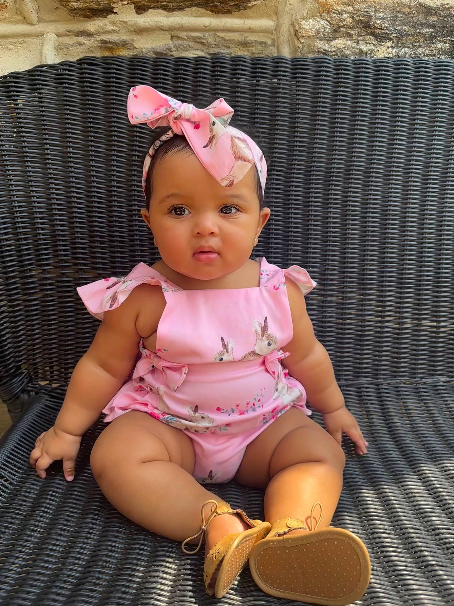 Zuri is registered to the contest to win money with this photo: baby, baby_toddler_clothing, cheek, child, doll, fashion_accessory, foot, headband, headwear, human_leg, magenta, pattern, peach, person, pink, sitting, skin, sleeve, sock, thigh