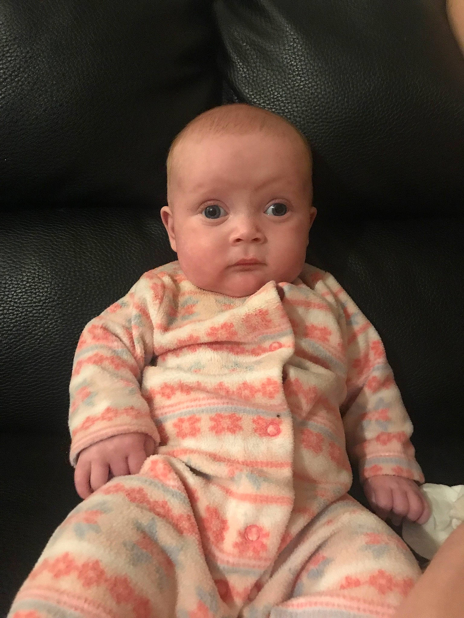 Lorena is registered to the contest to win money with this photo: baby, cheek, child, eye, face, finger, head, human, iris, lip, person, pink, sitting, skin, smile, toddler