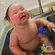 Michelle joined the competition — help win amazing prizes! architecture, baby, babylaughing, bathing, bathtub, building, crying, face, happy, head, hospital, laughing, person, photography, portrait, sad, smile, tub