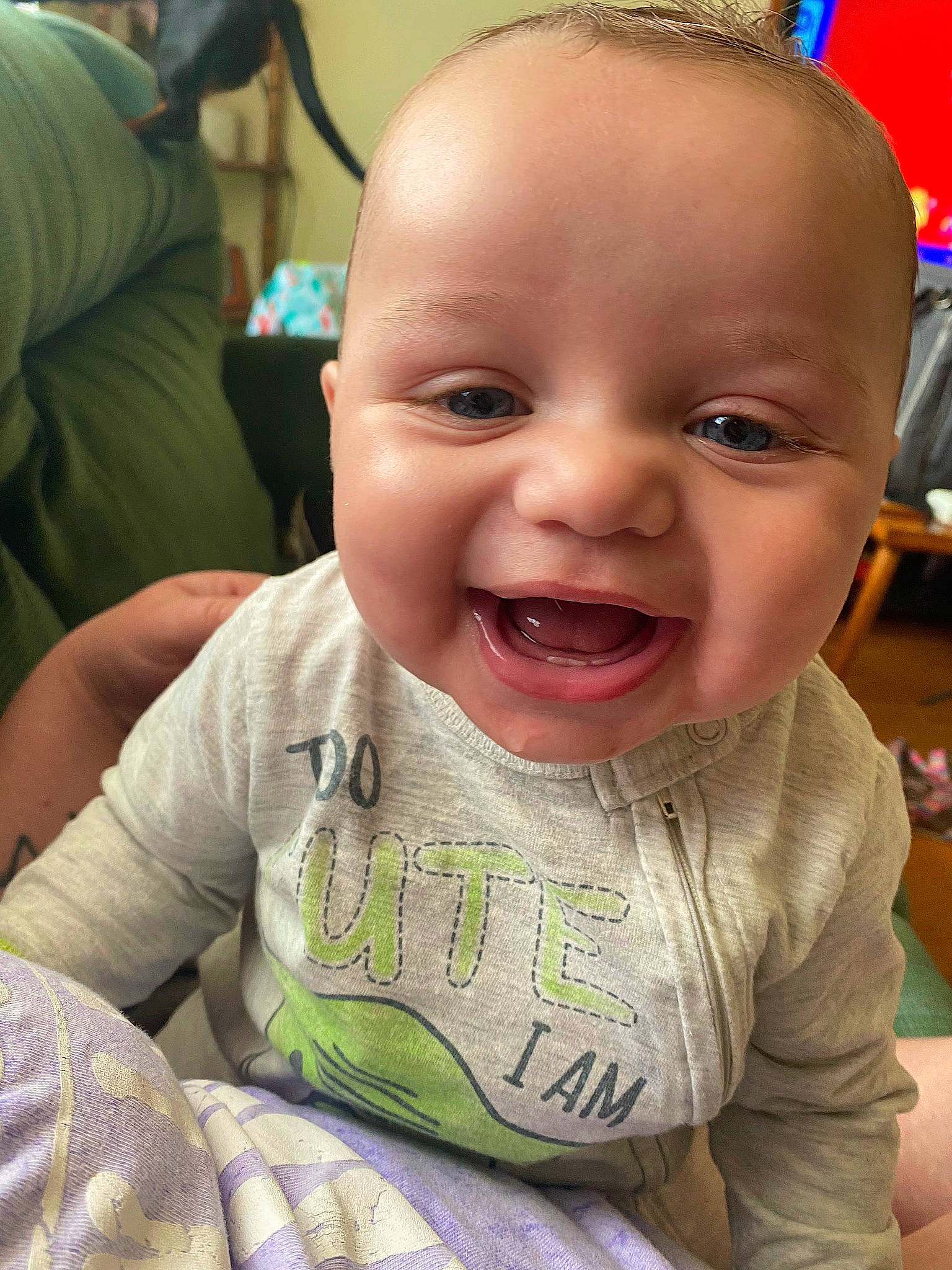 Dayton is registered to the contest to win money with this photo: baby, baby_toddler_clothing, cheek, child, ear, eyebrow, facial_expression, fun, grass, happy, iris, joy, lip, mouth, nose, people, person, skin, sleeve, smile