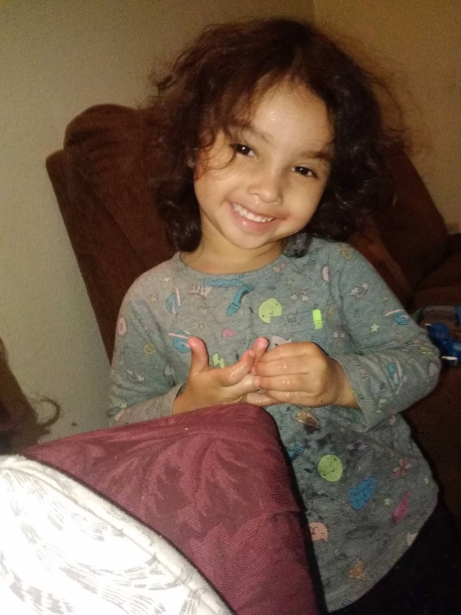 Leanne is registered to the contest to win money with this photo: brown_hair, child, eye, joy, long_hair, person, sitting, smile, toddler