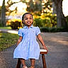 Jream is registered to the contest to win money with this photo: child, clothing, dress, face, female, footwear, formalwear, girl, happy, head, highheel, pants, person, photography, portrait, sandal, shoe, sitting, sleeve, smile