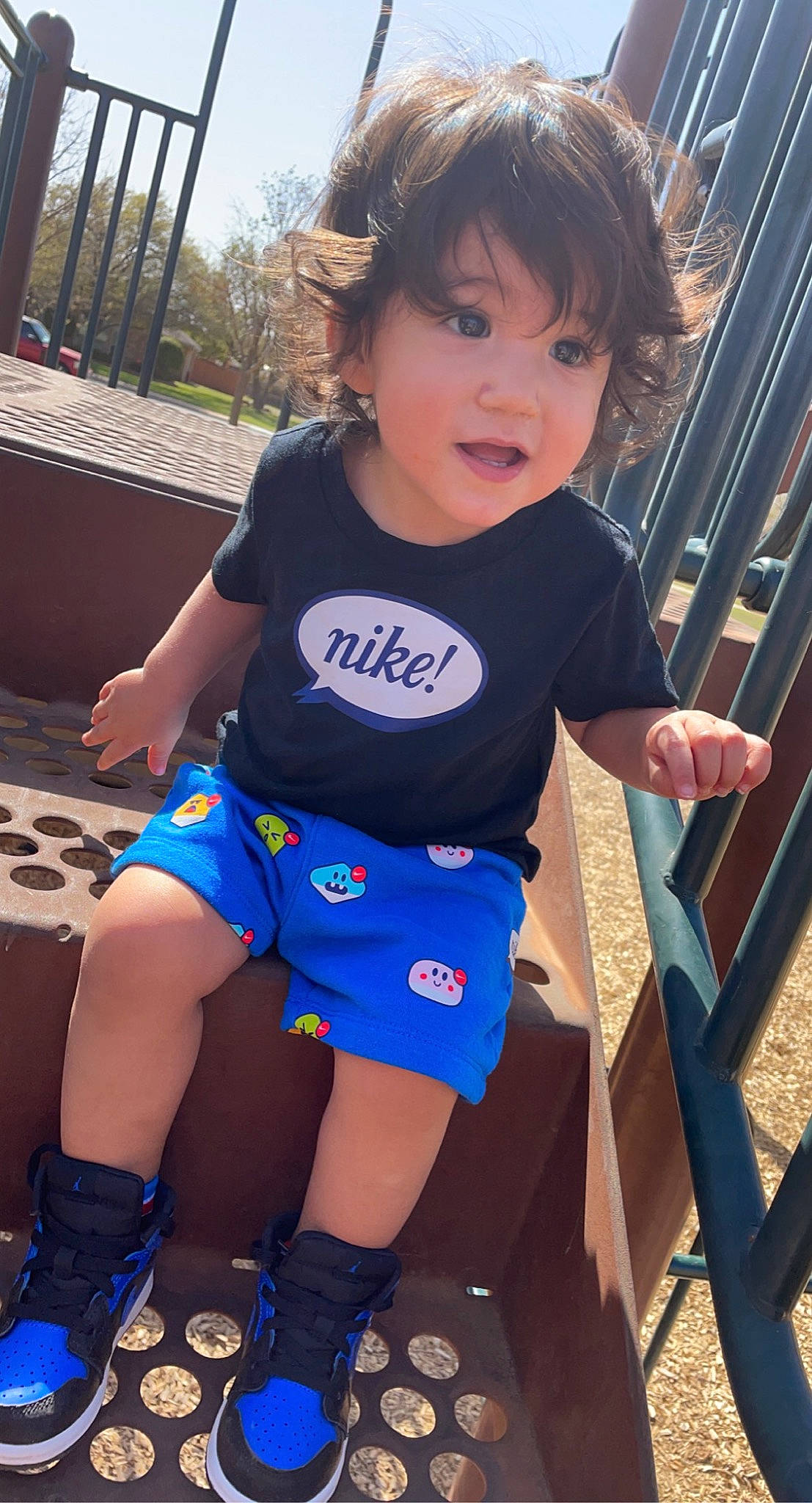 Liam is registered to the contest to win money with this photo: baby_toddler_clothing, blue, child, cool, electric_blue, face, facial_expression, finger, fun, hairstyle, happy, leisure, person, product, public_space, skin, sleeve, standing, t_shirt, thigh