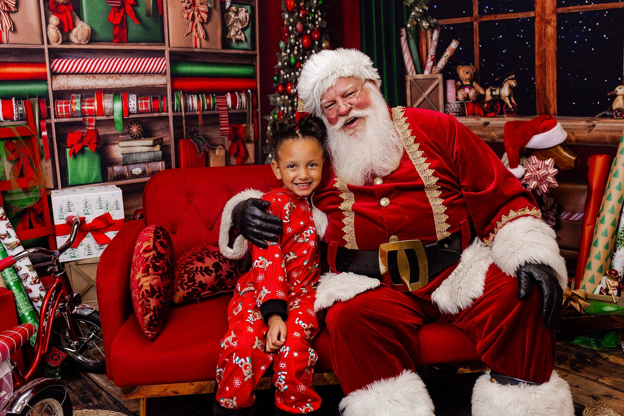 K'Tianna joined the competition — help win amazing prizes! beard, christmas, christmas_decoration, christmas_eve, event, fun, fur, happy, hat, headwear, holiday, joy, lap, pattern, person, santa_claus, sitting, smile, textile, tire