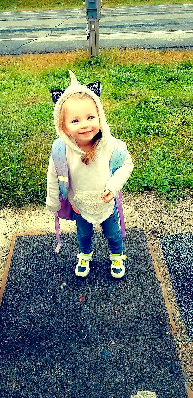 Raven is registered to the contest to win money with this photo: asphalt, baby_toddler_clothing, child, cool, electric_blue, eye, fun, grass, happy, head, joy, leaf, pattern, people_in_nature, person, plant, recreation, road_surface, smile, sunlight