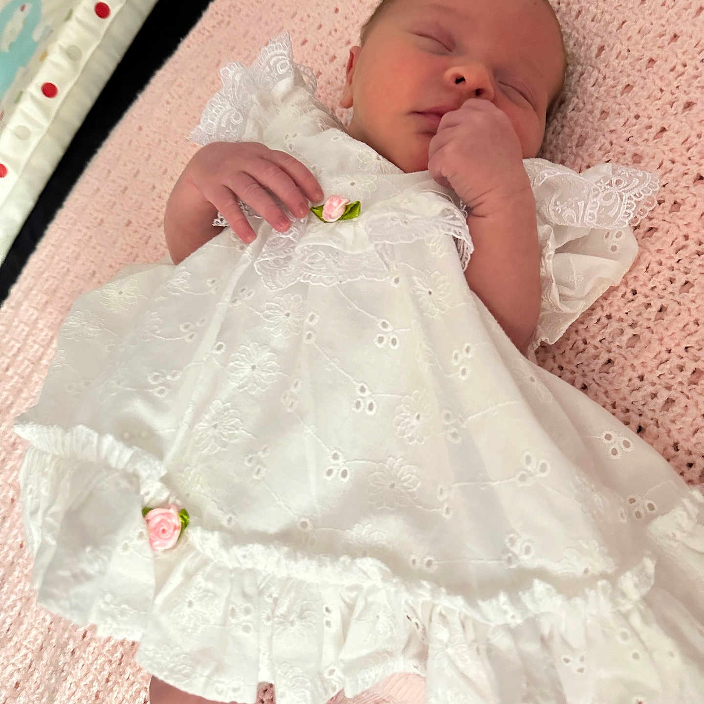 Arabella-Mae is registered to the contest to win money with this photo: baby, baby_bed, child, cozy, cute, face, hand, indoors, infant, knitted_blanket, lace, newborn, nursery, peaceful, pink_blanket, portrait, resting, sleeping, soft_texture, white_dress