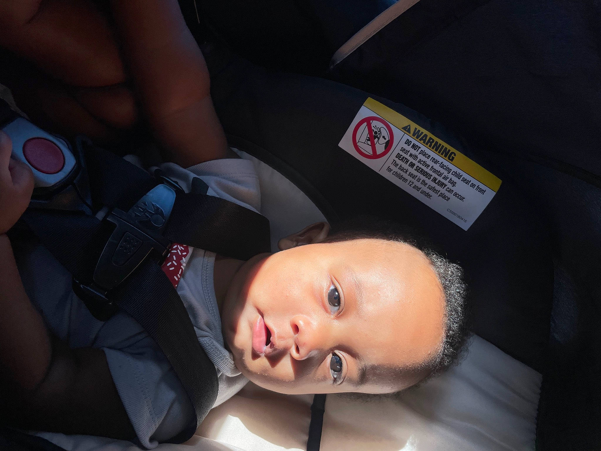 Dajon is registered to the contest to win money with this photo: auto_part, baby, baby_carriage, baby_products, car_seat, carmine, cheek, child, comfort, fashion_accessory, finger, flash_photography, gesture, human_leg, nail, person, personal_protective_equipment, sleep, thumb, toddler