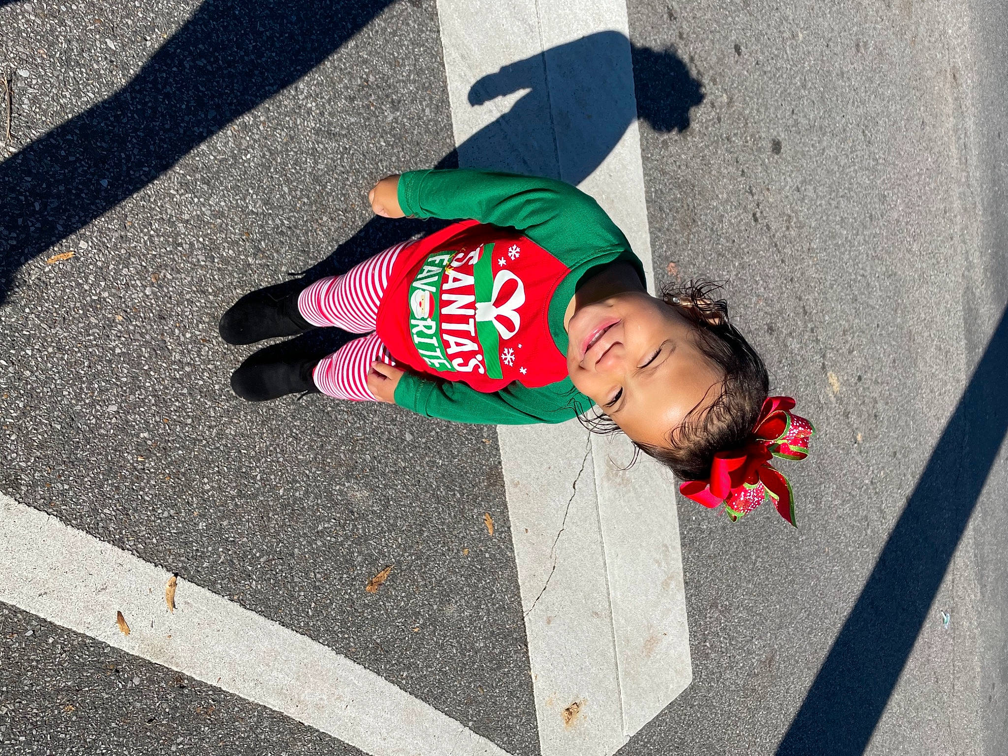 Iliana joined the competition — help win amazing prizes! asphalt, baby_toddler_clothing, carmine, joy, lane, person, road_surface, shadow, street, tar, toddler, walking_shoe