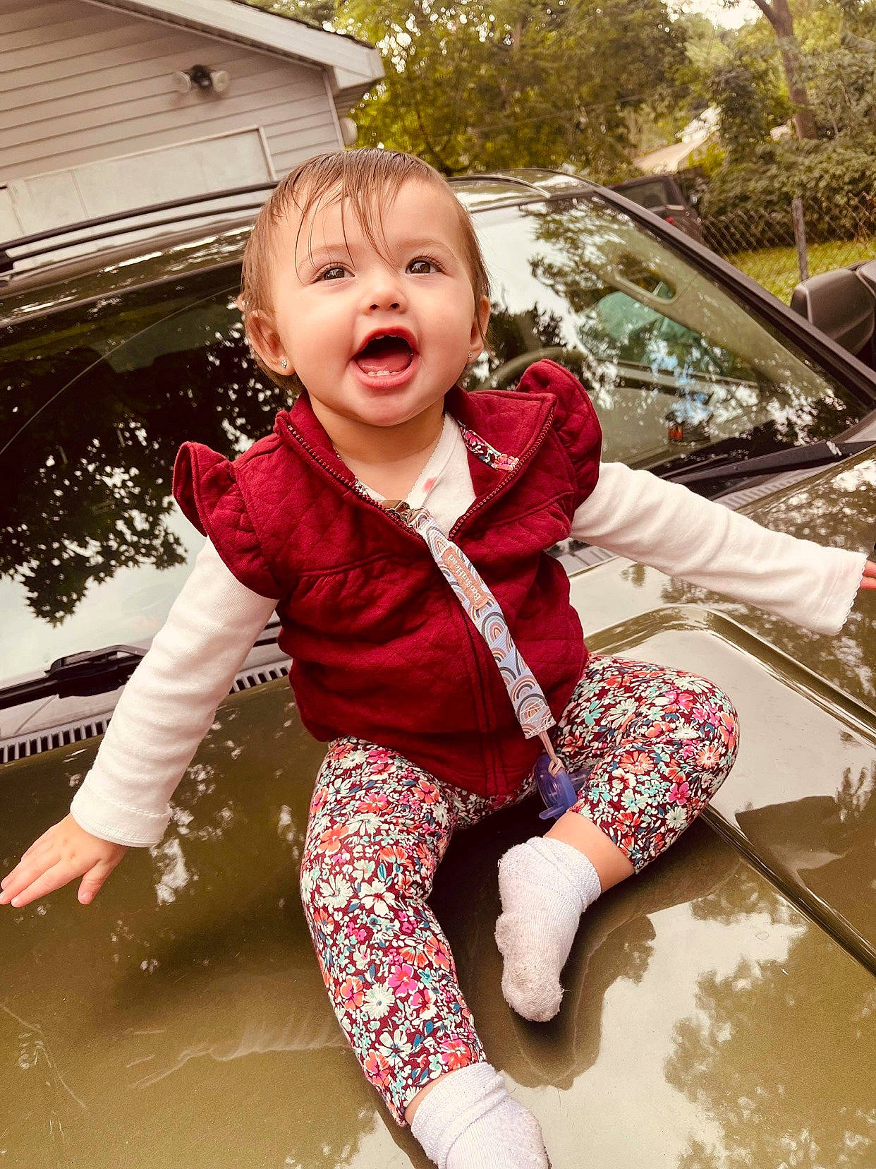 Amarionna is registered to the contest to win money with this photo: baby_toddler_clothing, car, child, cool, dress, fun, grass, happy, human_body, leisure, pattern, person, pink, recreation, sitting, sleeve, smile, toddler, tree, vehicle_door