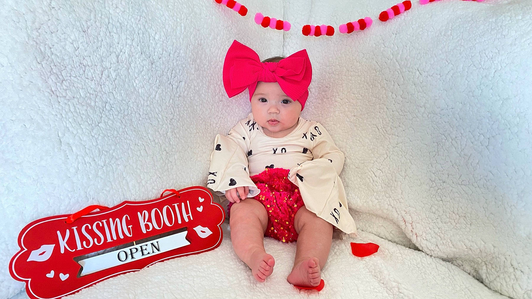 Meadow is registered to the contest to win money with this photo: baby_toddler_clothing, carmine, christmas_eve, costume, costume_hat, event, fashion_accessory, fictional_character, font, fur, happy, hat, headwear, holiday, magenta, mammal, pattern, person, pink, red