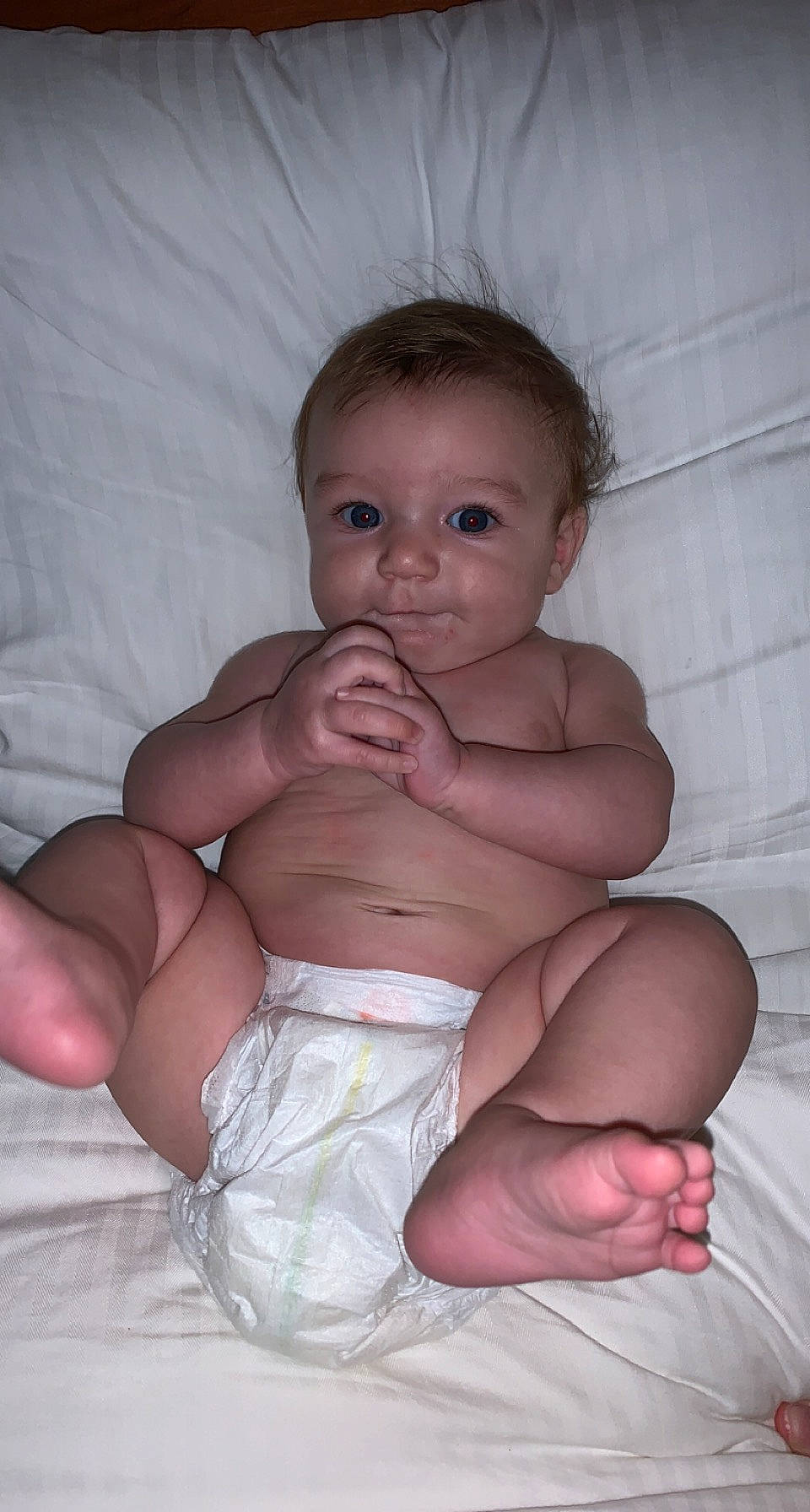 Kaylee is registered to the contest to win money with this photo: arm, baby, cheek, chin, comfort, eye, eyebrow, facial_expression, gesture, hand, human_body, iris, leg, lip, mouth, neck, nose, person, shoulder, skin