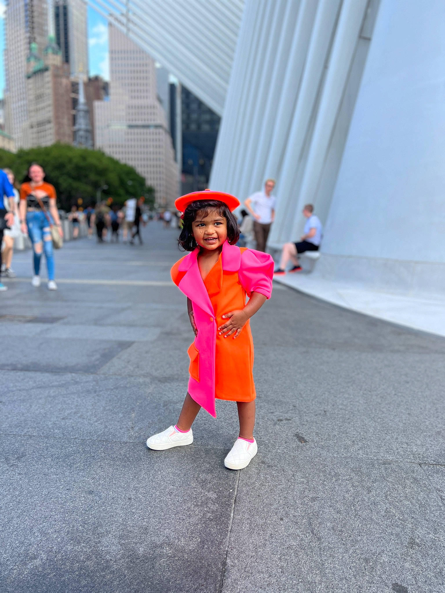 Rhea joined the competition — help win amazing prizes! asphalt, blurred, building, costume, electric_blue, event, fun, happy, hat, leisure, magenta, orange, pedestrian, person, recreation, road, road_surface, smile, street, sun_hat