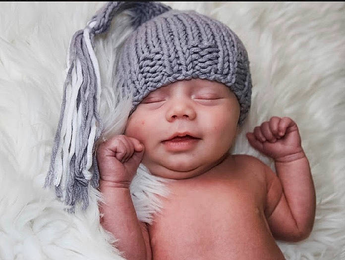 Nicholas joined the competition — help win amazing prizes! baby, baby_sleeping, beanie, bonnet, cap, cheek, child, eye, face, hand, head, headgear, headwear, knit_cap, lip, nose, person, photograph, skin, sleep