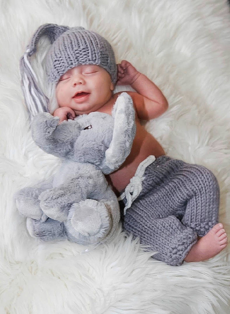 Nicholas joined the competition — help win amazing prizes! baby, baby_sleeping, bonnet, child, fur, fur_clothing, headgear, headwear, knit_cap, knitting, person, photograph, photography, portrait_photography, sleep, toddler, wool