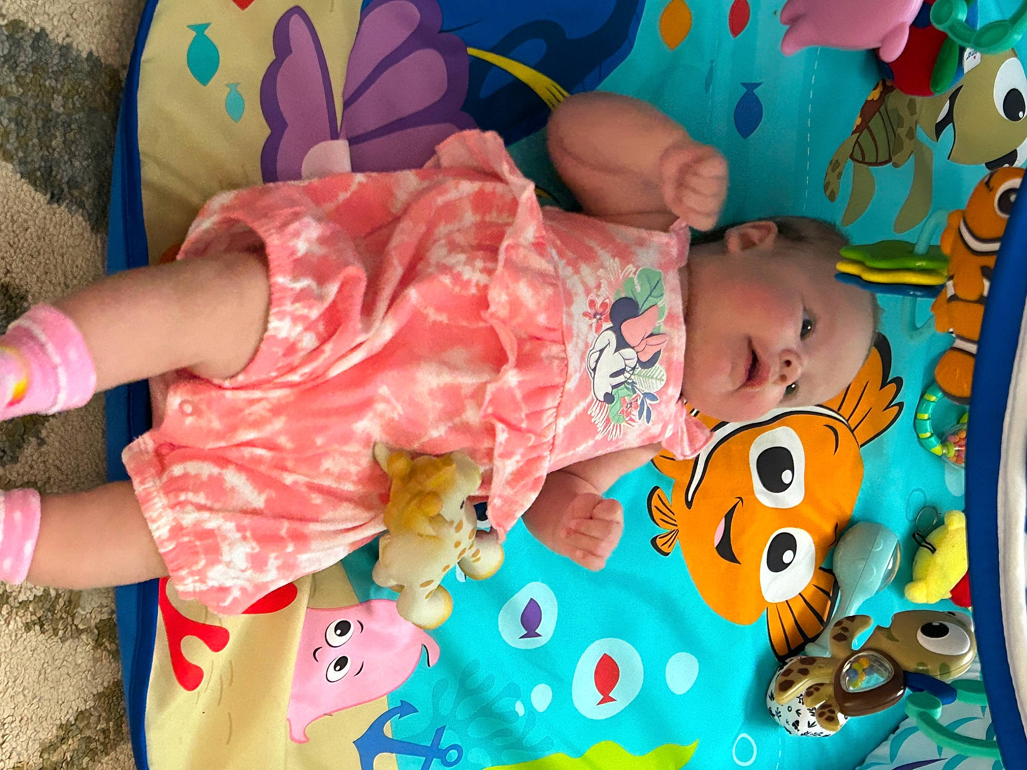 Skyler joined the competition — help win amazing prizes! arm, baby, baby_toddler_clothing, blue, cheek, child, eye, face, facial_expression, fun, happy, head, human_body, mammal, mouth, person, pink, skin, textile, toddler