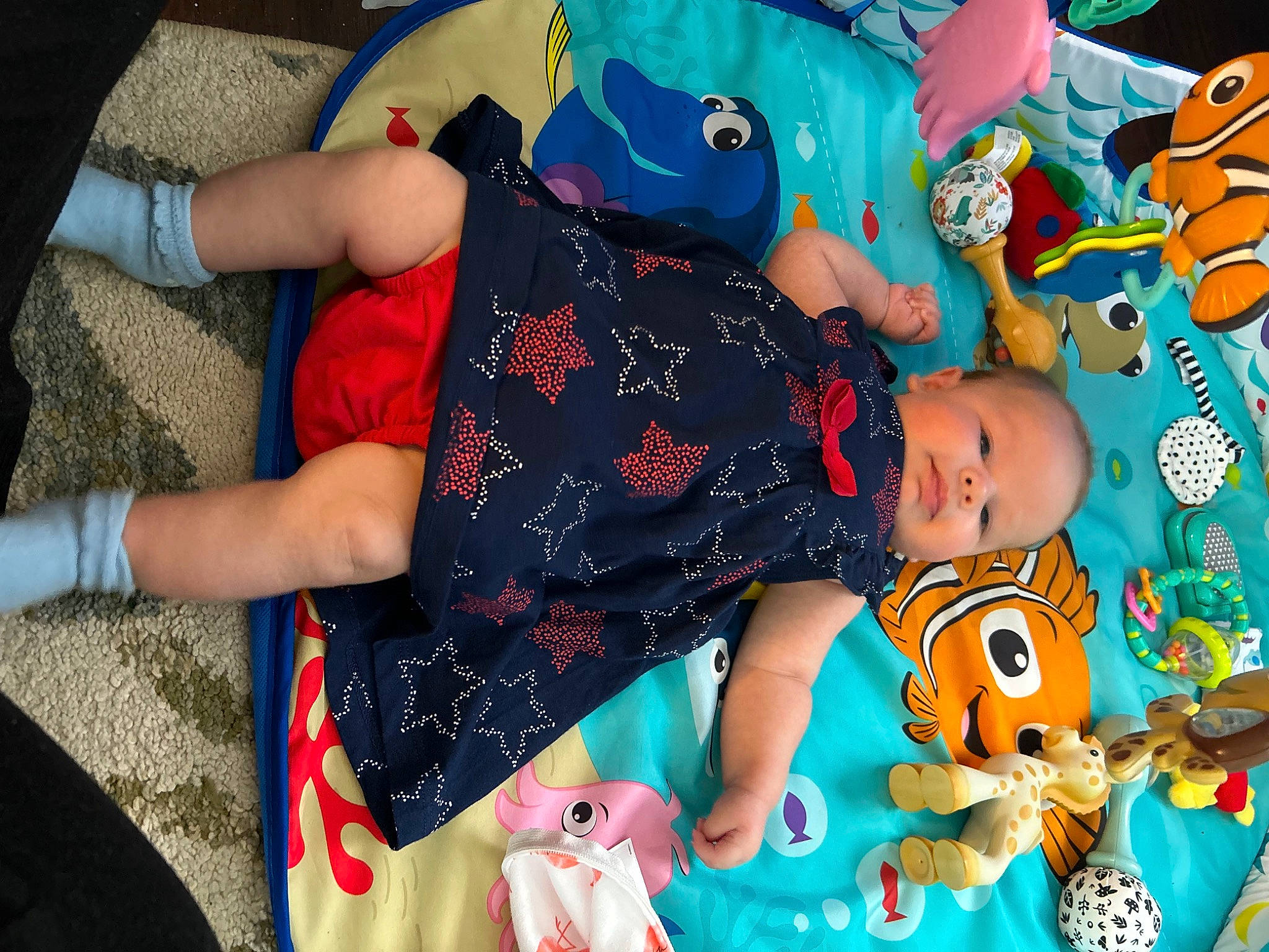 Skyler joined the competition — help win amazing prizes! art, baby, baby_products, baby_toddler_clothing, baby_toys, blue, child, event, fun, happy, lap, linens, pattern, person, play, room, textile, toddler, toy