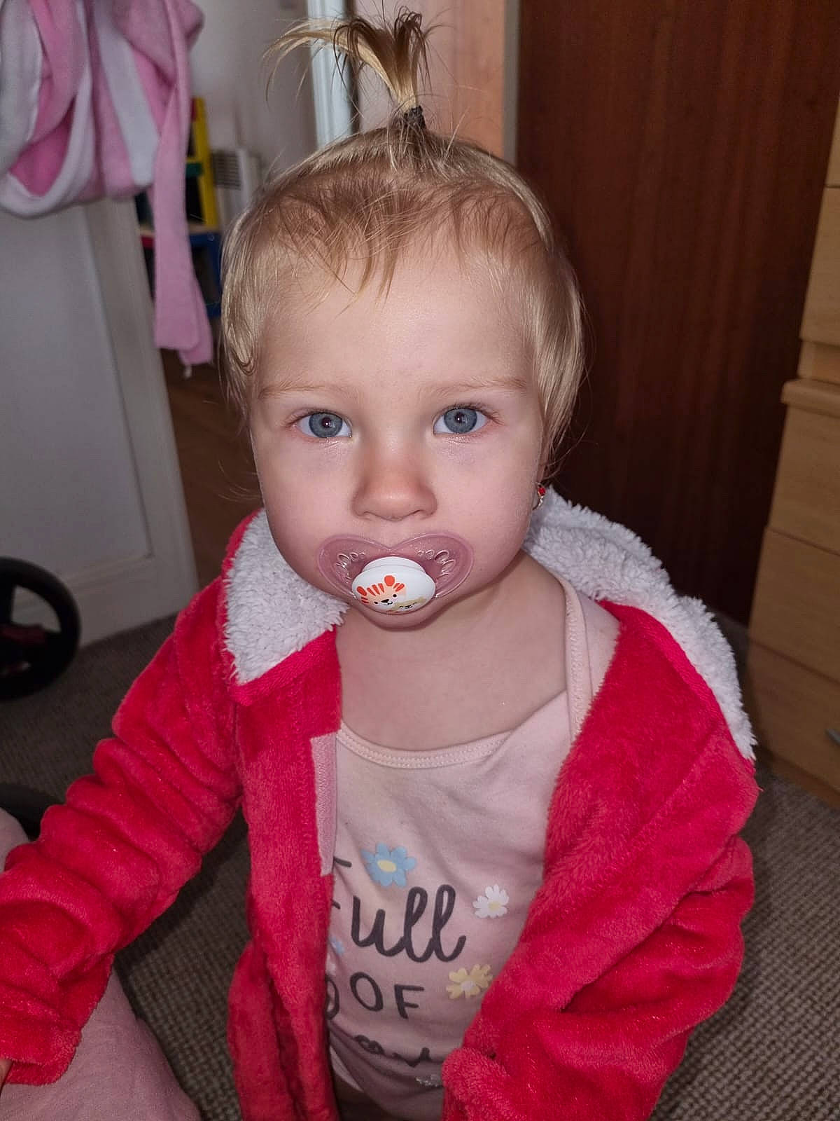 Evelin is registered to the contest to win money with this photo: baby, baby_toddler_clothing, cheek, chin, ear, eye, eyelash, facial_expression, food, hairstyle, head, human_body, iris, lip, mouth, neck, nose, person, pink, skin