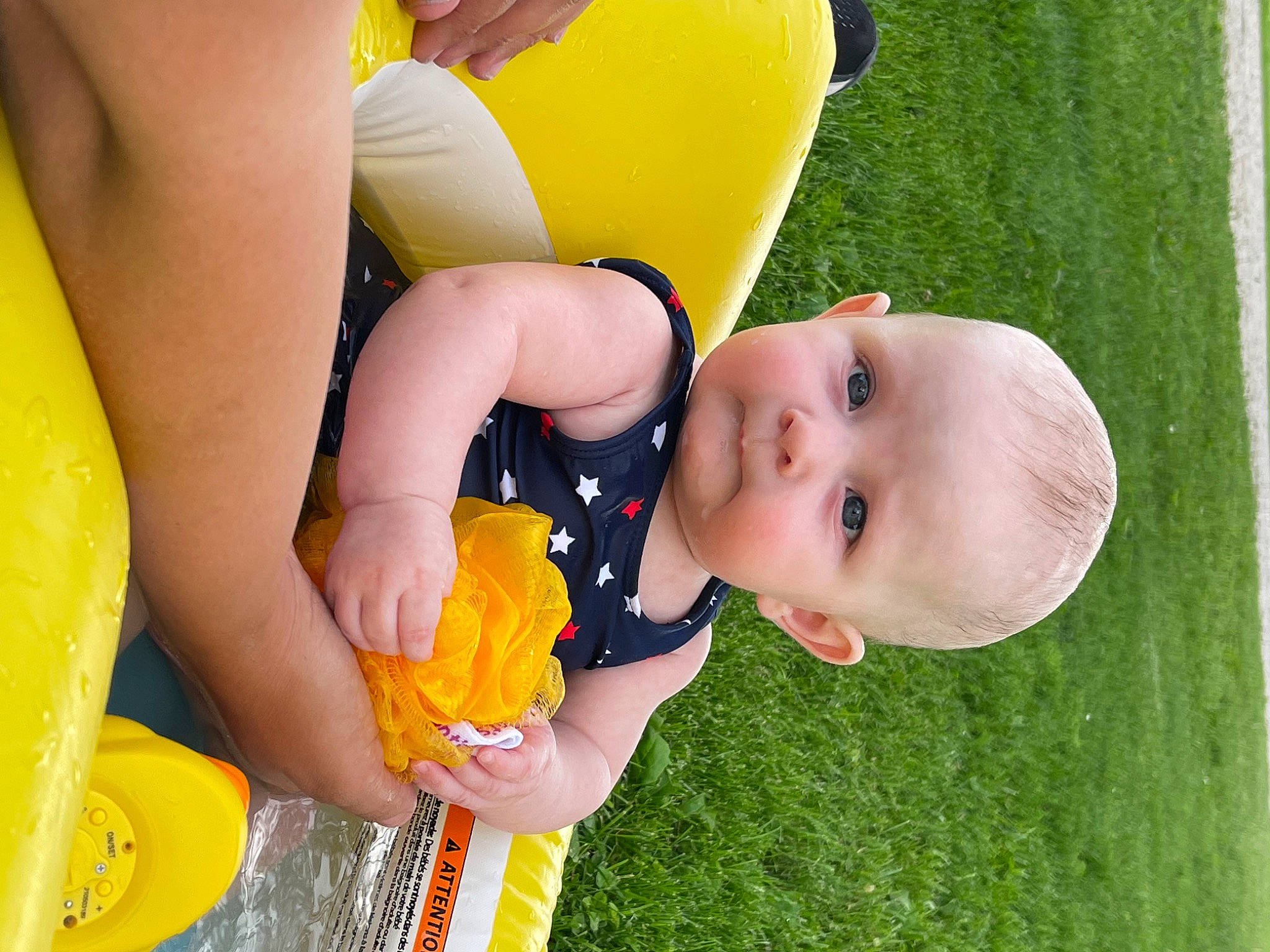 Veyda is registered to the contest to win money with this photo: arm, baby, baby_playing_with_toys, baby_toddler_clothing, finger, fun, grass, hand, happy, human_body, leisure, nose, organ, people_in_nature, person, plant, playing_with_kids, skin, smile, toddler