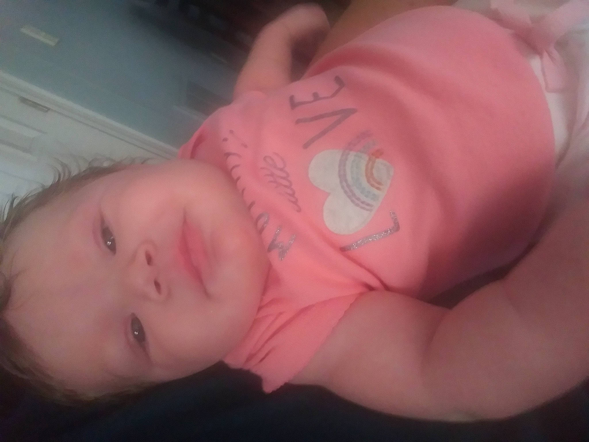 Mariah is registered to the contest to win money with this photo: baby, baby_toddler_clothing, bedtime, cheek, child, comfort, ear, eyelash, finger, flesh, hand, lip, mouth, nap, nose, person, pink, room, skin, sleep