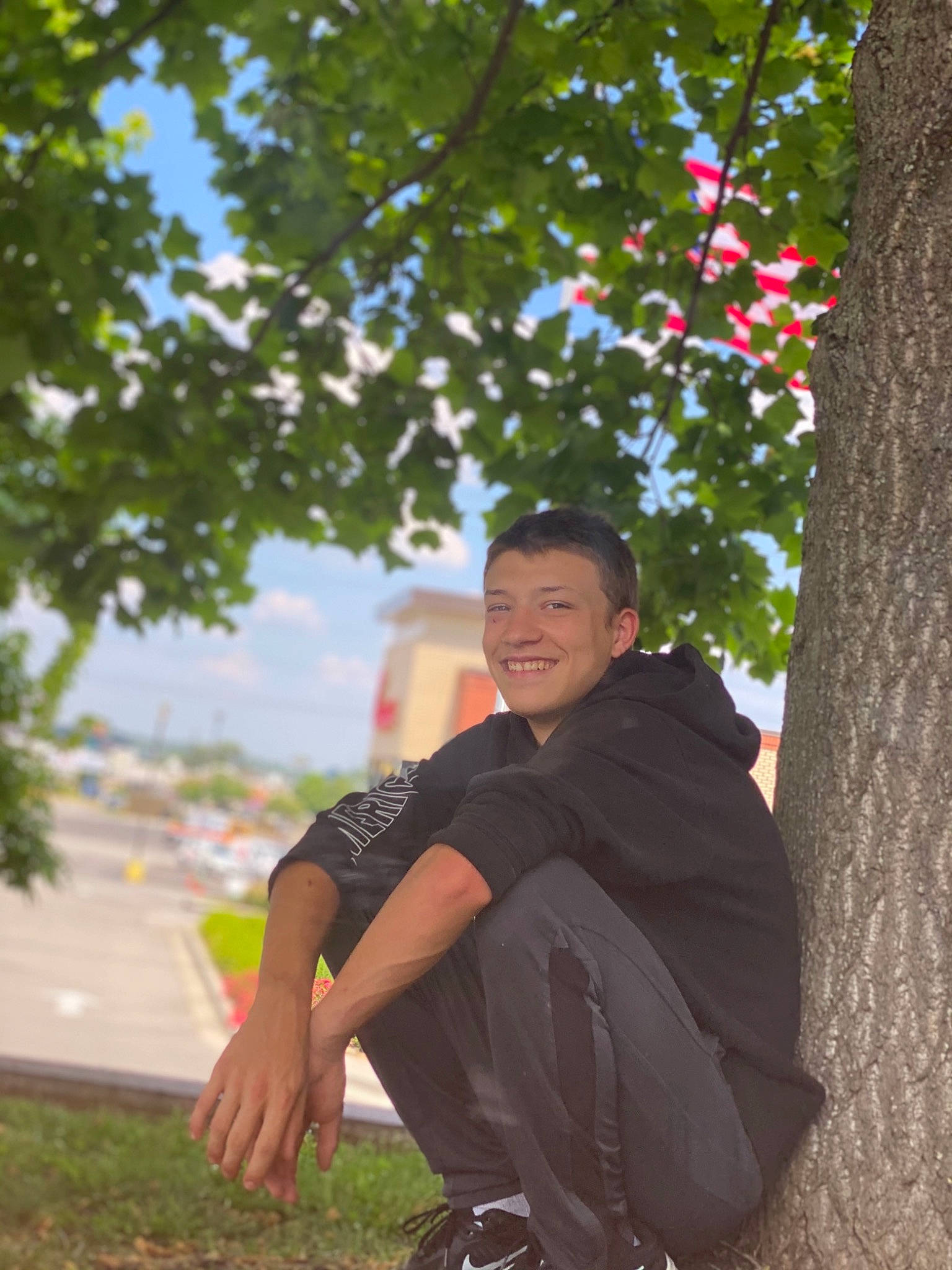 Aiden joined the competition — help win amazing prizes! eyewear, flash_photography, formal_wear, fun, gesture, grass, happy, joy, leaf, leisure, people_in_nature, person, plant, recreation, rock, sitting, sky, smile, temple, tints_and_shades