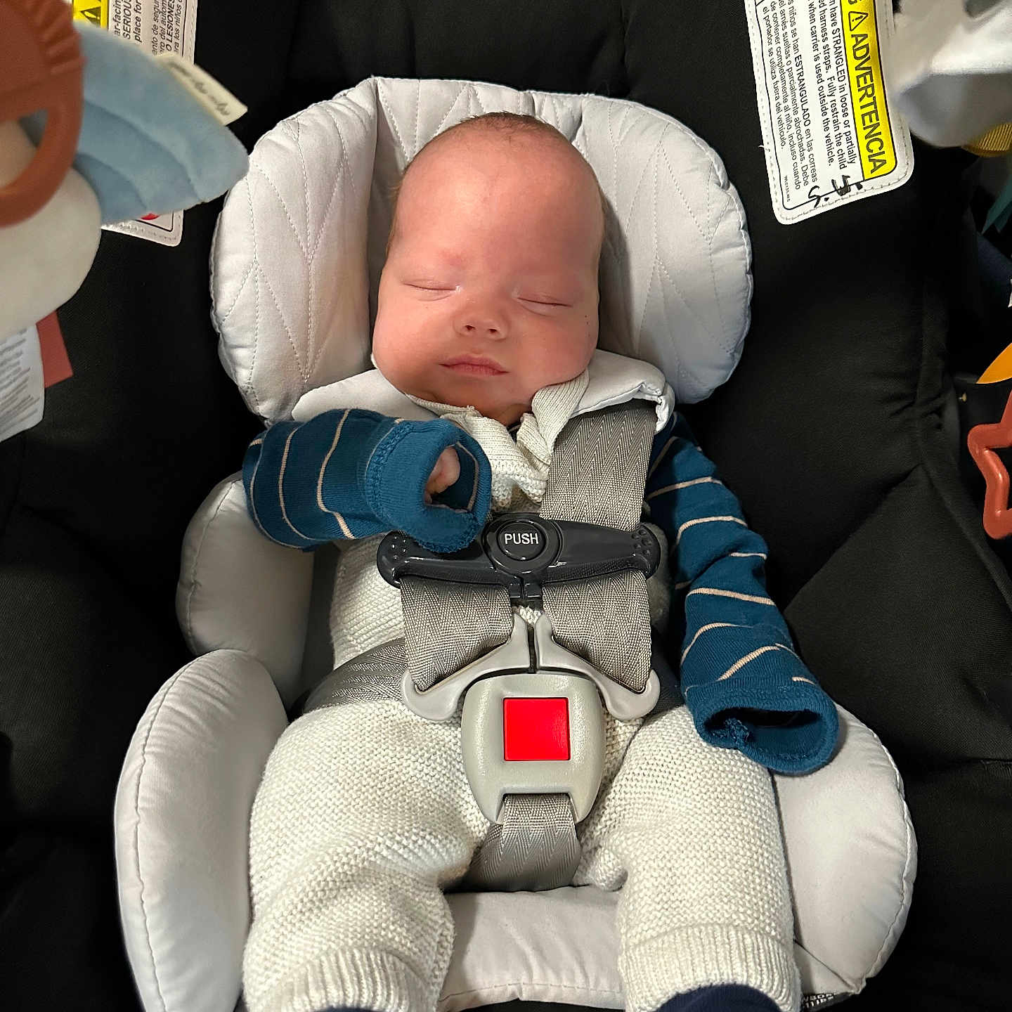Sawyer is registered to the contest to win money with this photo: accessories, architecture, baby, baseball, baseballglove, bed, belt, blanket, bodypart, bonnet, building, car, car_interior, carseat, clothing, coat, couch, cradle, crib, cushion