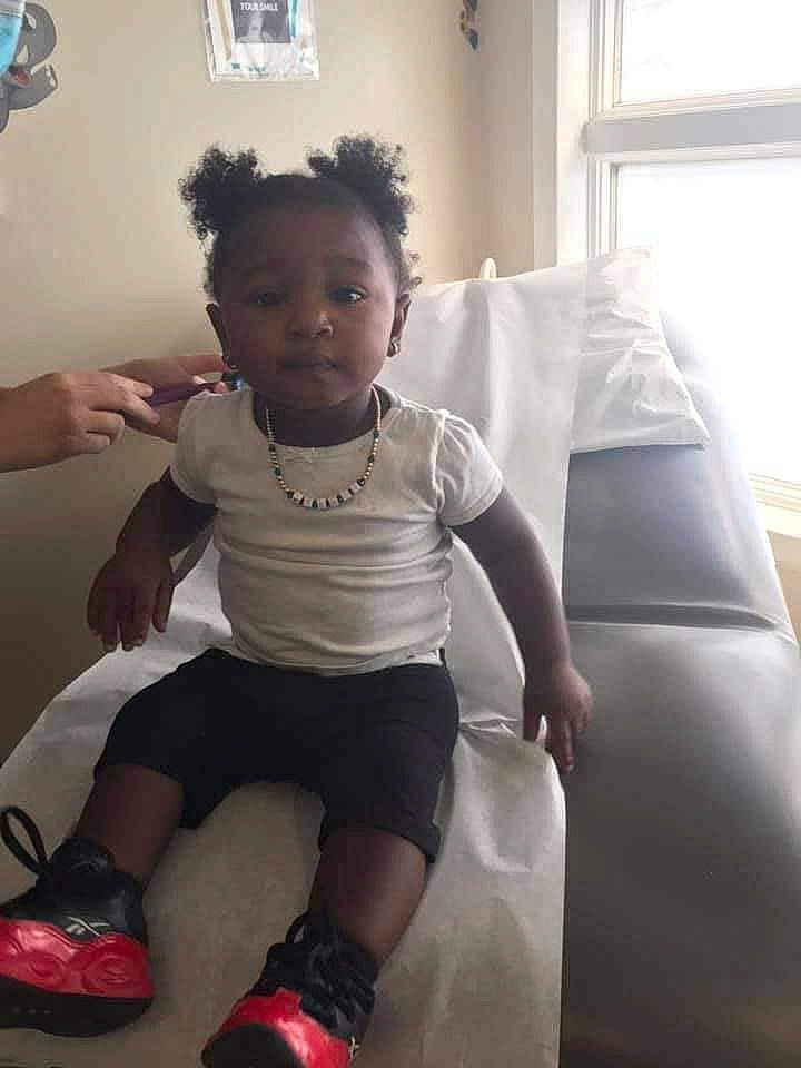 Kelani joined the competition — help win amazing prizes! baby, baby_toddler_clothing, child, comfort, cool, facial_expression, finger, flooring, fun, hair, hairstyle, happy, knee, person, shorts, shoulder, skin, sleeve, thigh, toddler