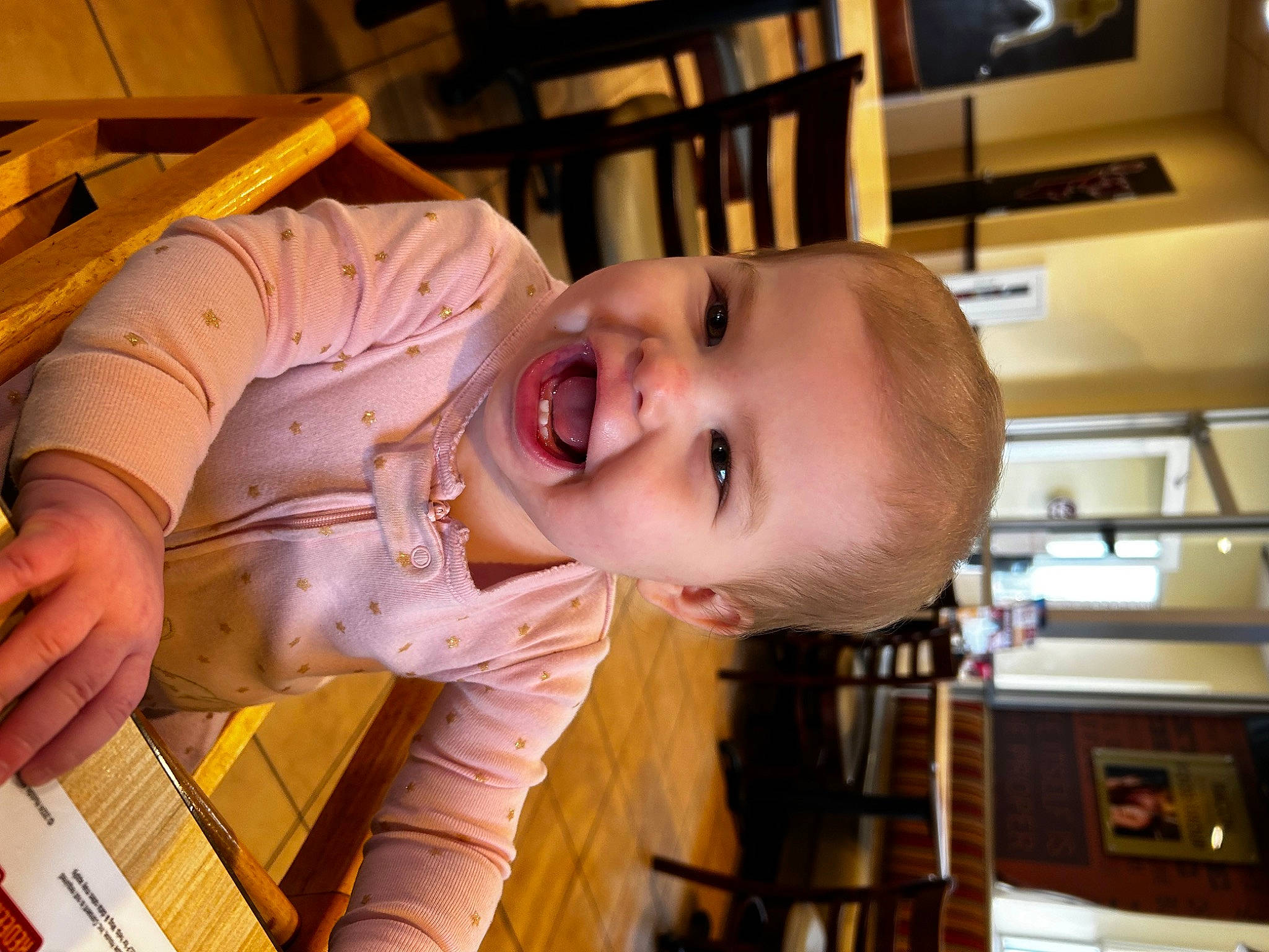 Blareabella is registered to the contest to win money with this photo: baby, baby_laughing, baby_toddler_clothing, cheek, child, fun, happy, laugh, mouth, person, room, sitting, smile, t_shirt, toddler, wood