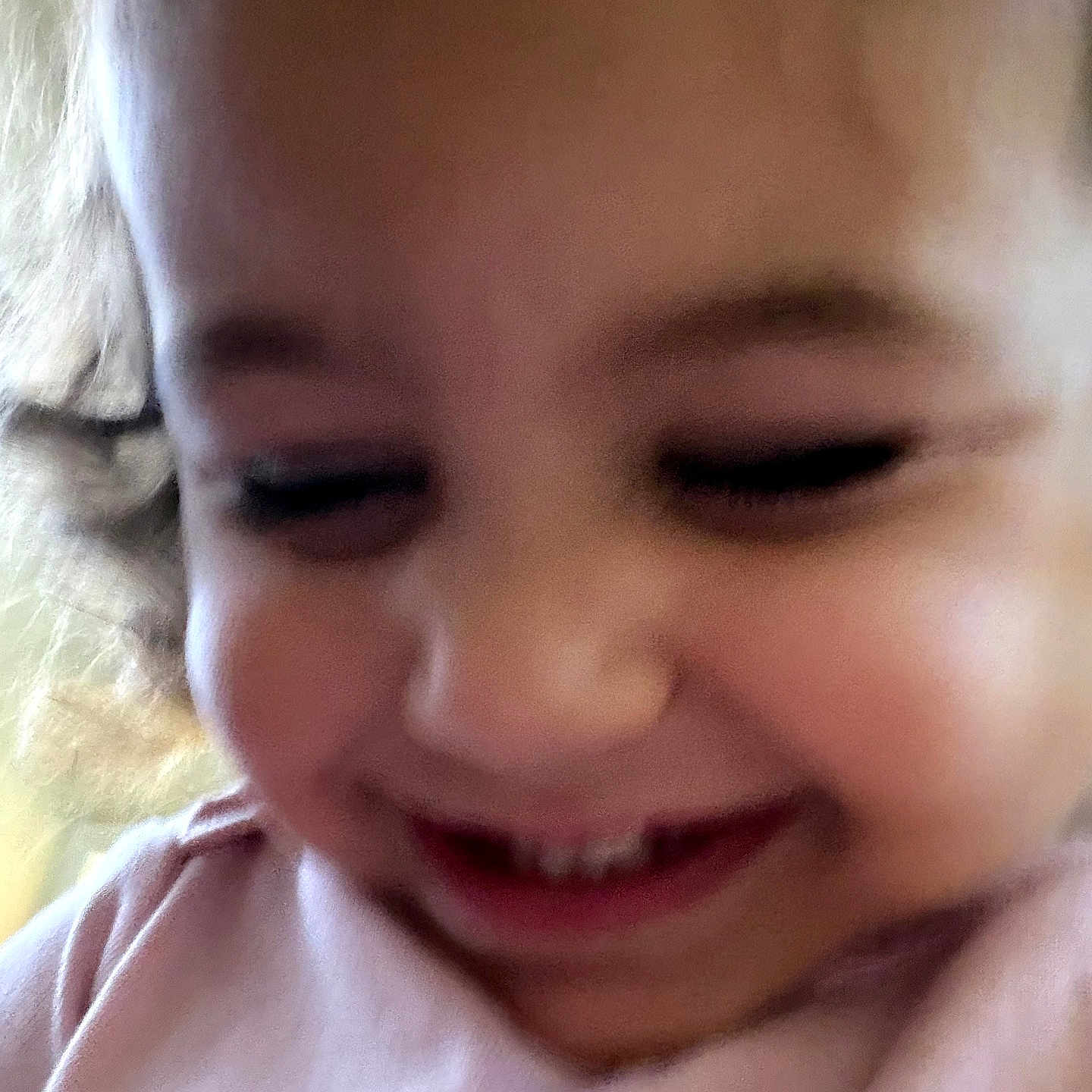 Alexandra joined the competition — help win amazing prizes! child, toddler, portrait, face, smiling, eyes_closed, close_up, indoor, pink_clothing, blonde_hair, young_child, happy, soft_focus, photograph, head, cheeks, nose, mouth, warm_lighting, candid
