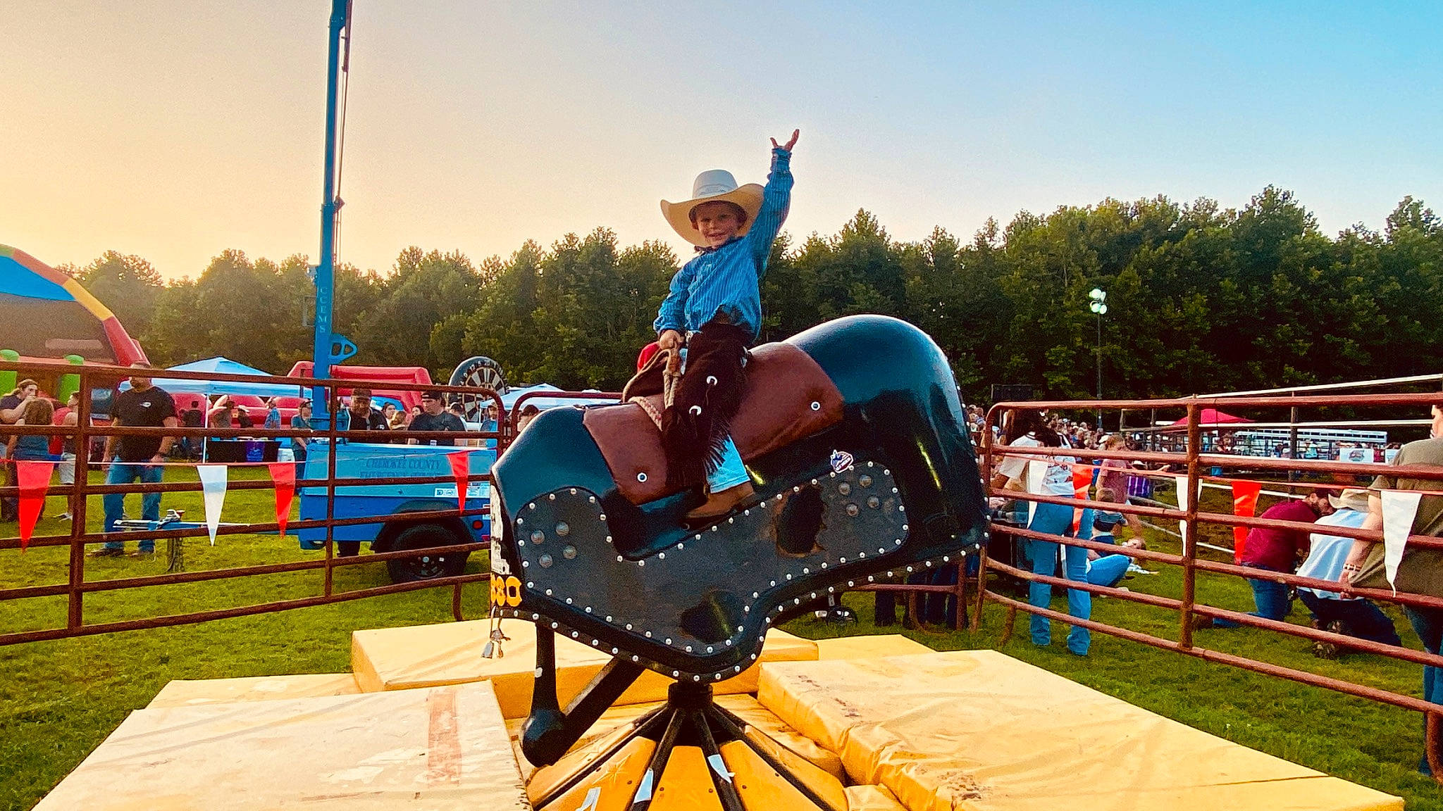Jackson James joined the competition — help win amazing prizes! amusement_ride, animal_sports, bridle, competition, competition_event, electric_blue, fun, grass, headwear, horse_tack, joy, leisure, nonbuilding_structure, outdoor_play_equipment, person, playground, recreation, saddle, sky, sport_venue