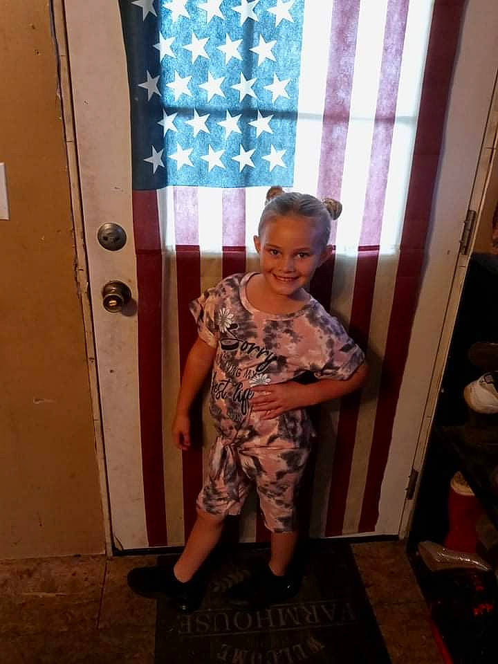 Serenity is registered to the contest to win money with this photo: army, curtain, door, fashion_design, flooring, fun, home_door, human_leg, joy, magenta, military_camouflage, military_person, military_uniform, pattern, person, room, sandal, smile, thigh, uniform