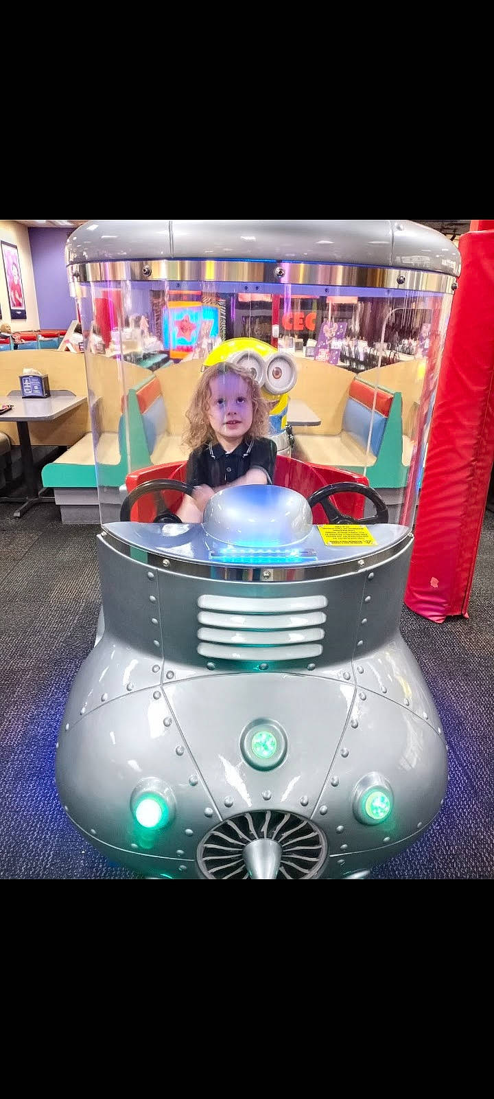 Moses is registered to the contest to win money with this photo: amusement_park, amusement_ride, automotive_design, automotive_exterior, bumper, child, electric_blue, fictional_character, flooring, fun, games, leisure, machine, motor_vehicle, person, photograph, product, recreation, smile, snapshot