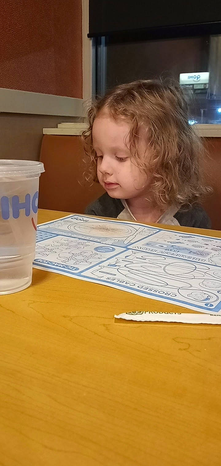 Moses joined the competition — help win amazing prizes! chair, child, curious, desk, flooring, fun, hardwood, homework, learning, office_equipment, person, picture_frame, room, table, television, toddler, varnish, wood, wood_stain, writing