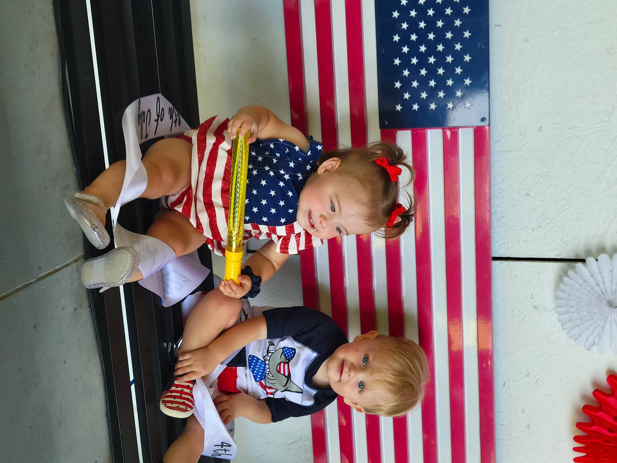 Molly joined the competition — help win amazing prizes! baby, baby_products, baby_toddler_clothing, child, event, flag, flag_day_usa, flag_of_the_united_states, fun, happy, hat, holiday, leisure, mechanical_fan, pattern, person, red, shorts, t_shirt, toddler