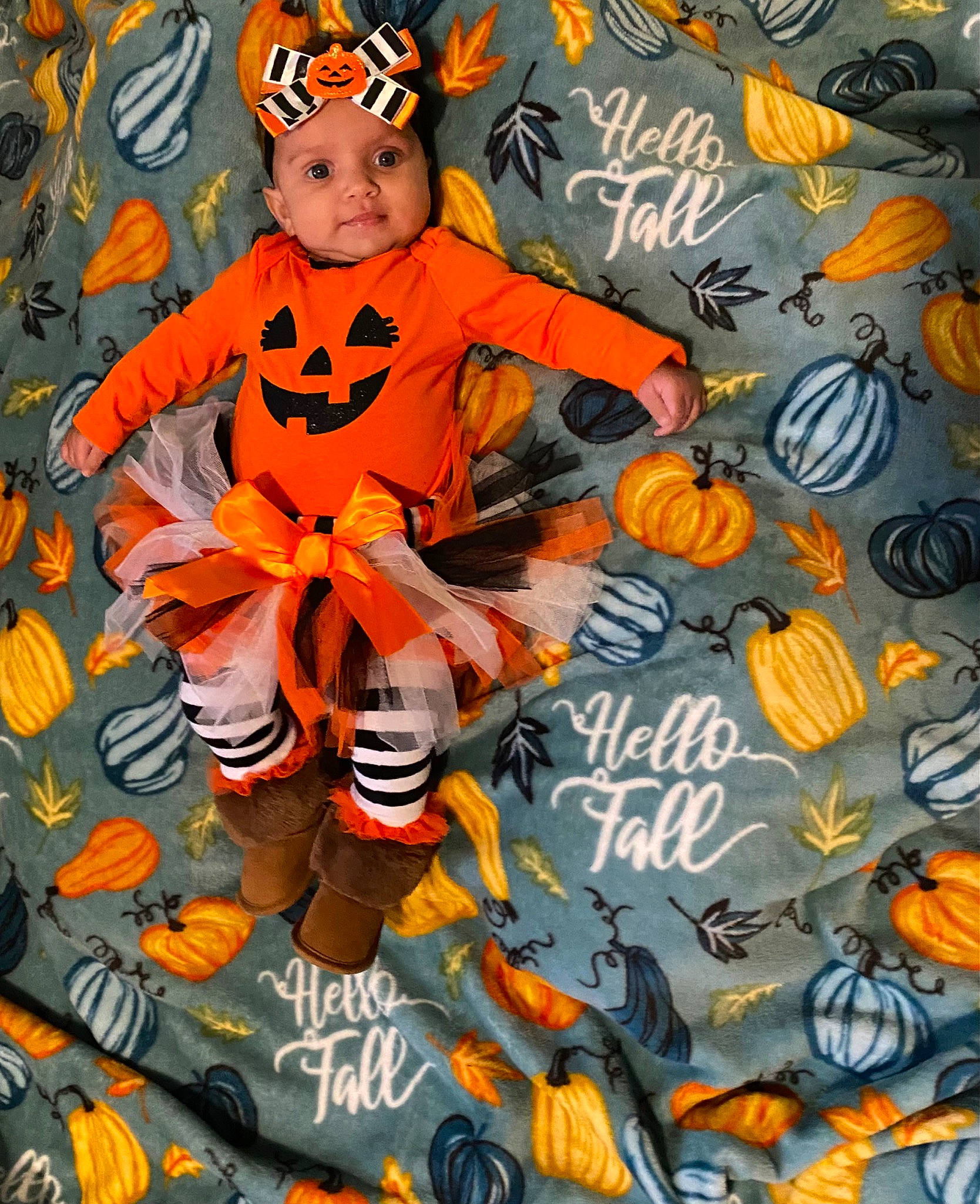 Kyleigh is registered to the contest to win money with this photo: art, baby_toddler_clothing, calabaza, child, fictional_character, fish, font, fun, graphics, happy, headwear, insect, orange, pattern, person, photo_caption, pollinator, pumpkin, toddler, trick_or_treat