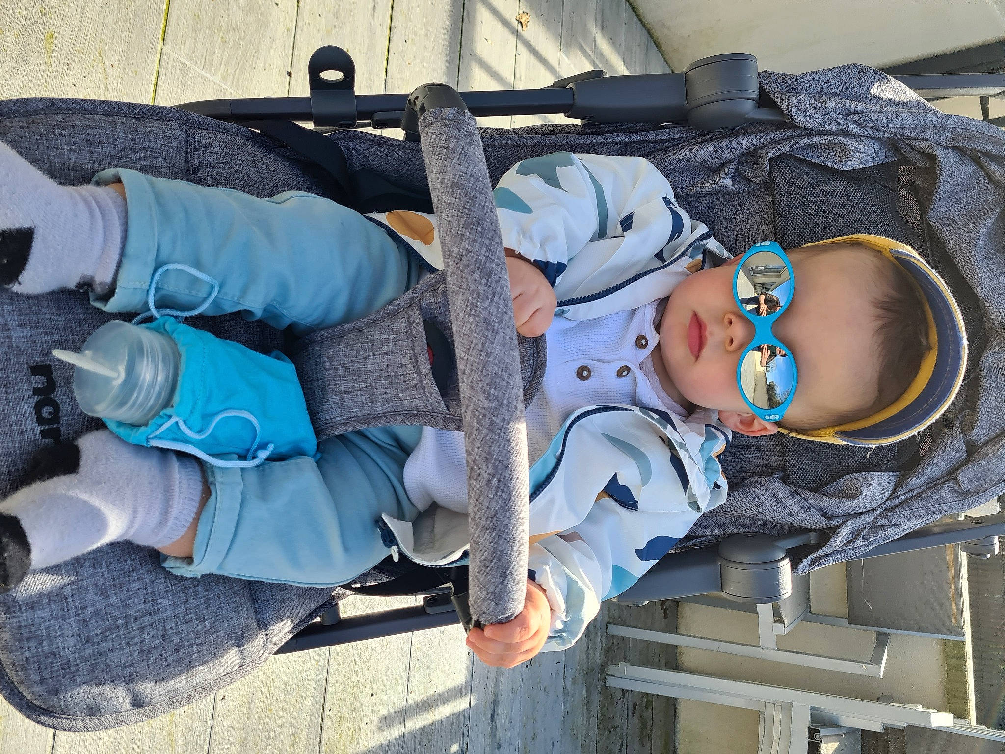 Owen a rejoint le concours — aidez-le/la à gagner de superbes lots ! baby, baby_carriage, baby_products, baby_toddler_clothing, child, comfort, electric_blue, hat, human_leg, leisure, person, sitting, sneakers, sock, toddler, walking_shoe